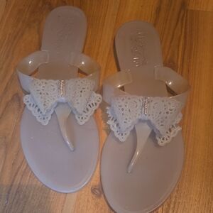 Lace Bow Ferragamo Jelly Thong Sandals -beige